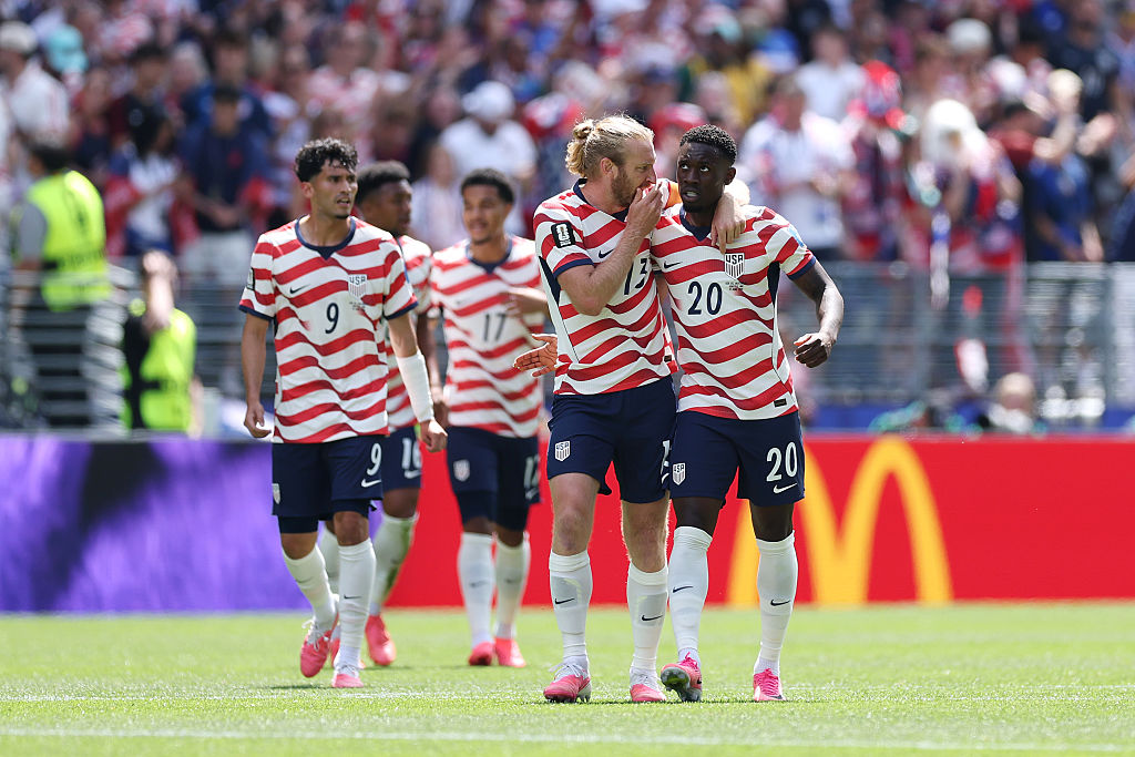 Players of the United States celebrate against Australia