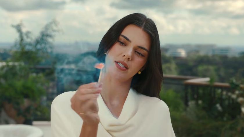 Kendall Jenner is shown with a lit match in a Fanatics Sportsbook ad for Super Bowl LX in 2026.