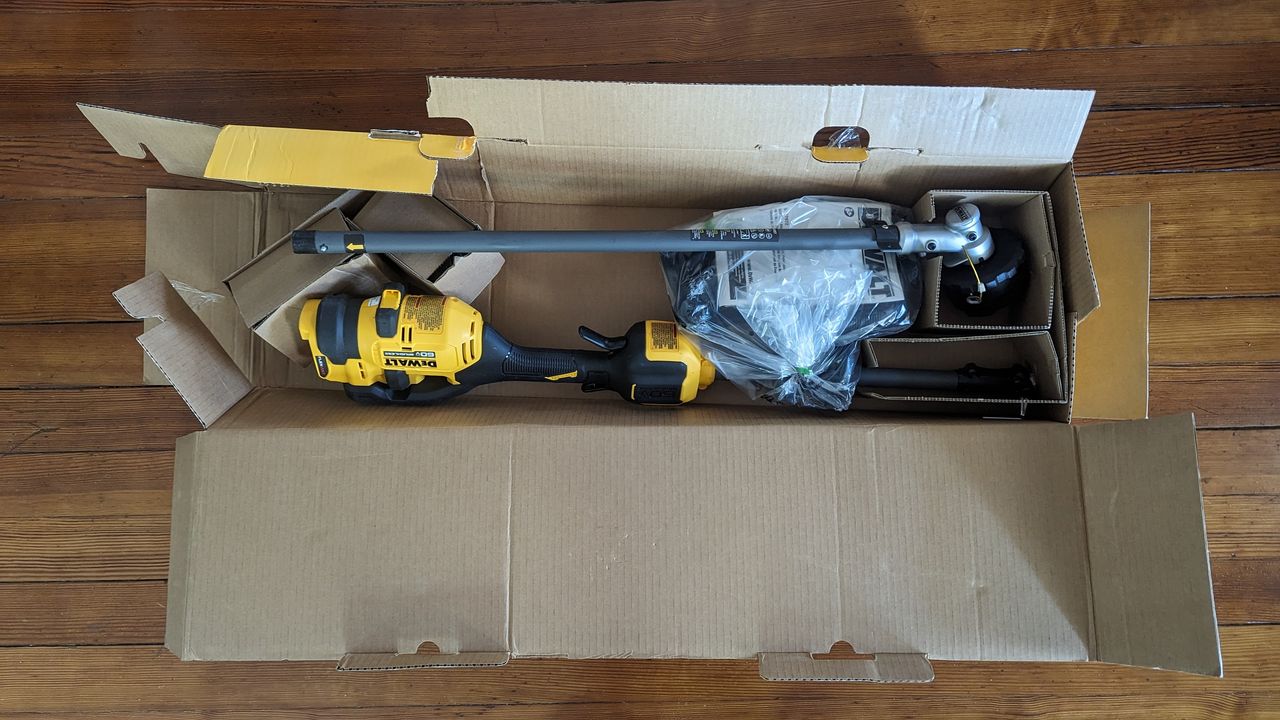 unboxing the dewslt cordless string trimmer with brushcutter attachment