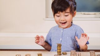 Young boy counting money