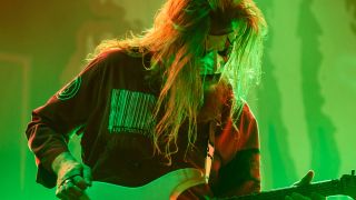 Jim Root performing with Slipknot in 2024