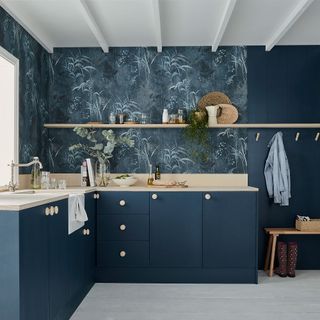 blue kitchen with restore midnight wallpaper and plywood worktop
