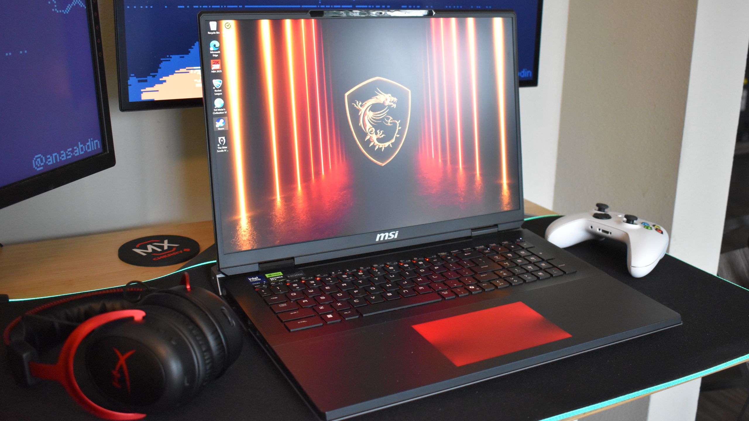MSI Titan 18 HX AI gaming laptop on a black mouse pad