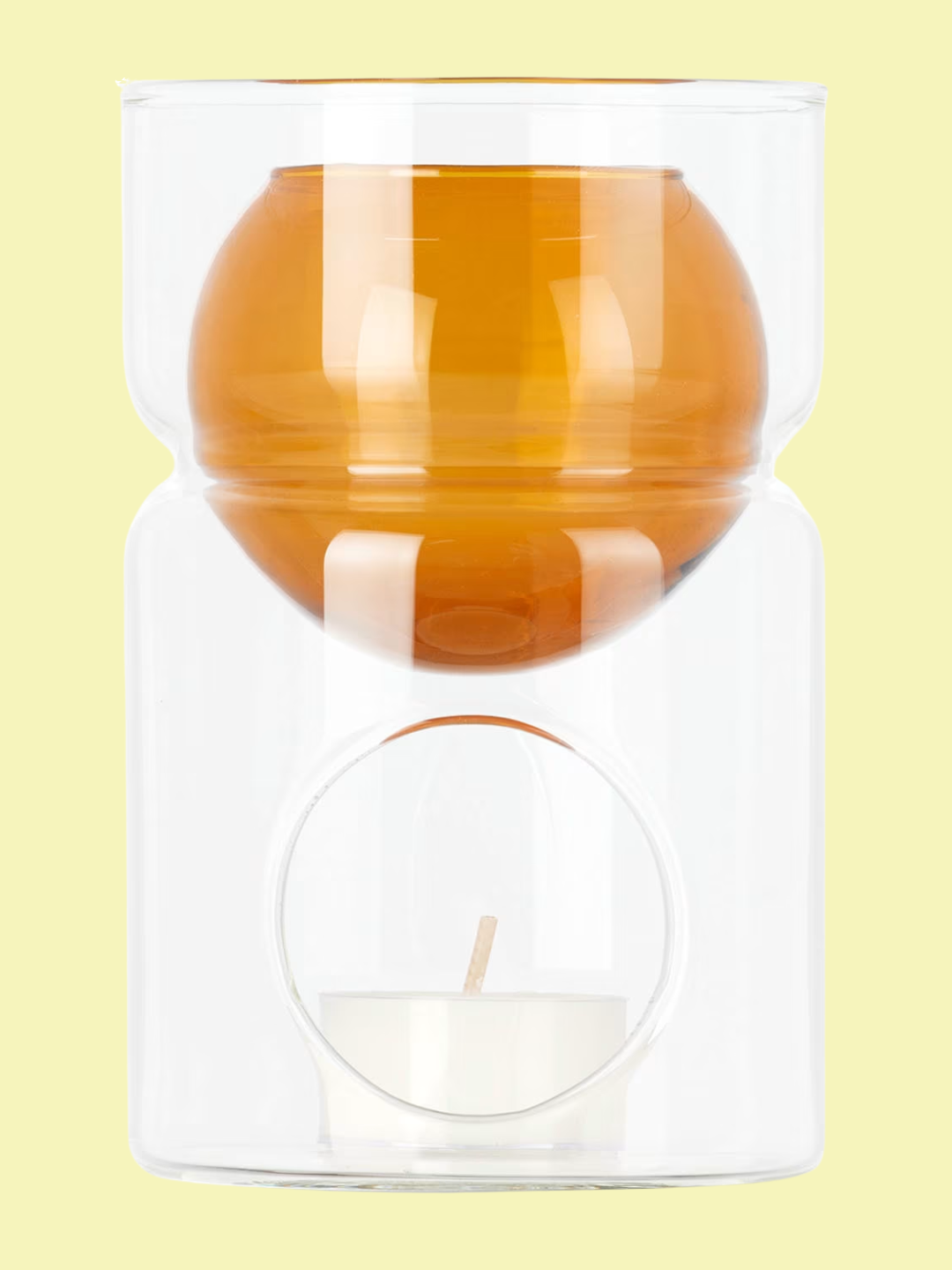 A glass and amber oil burner