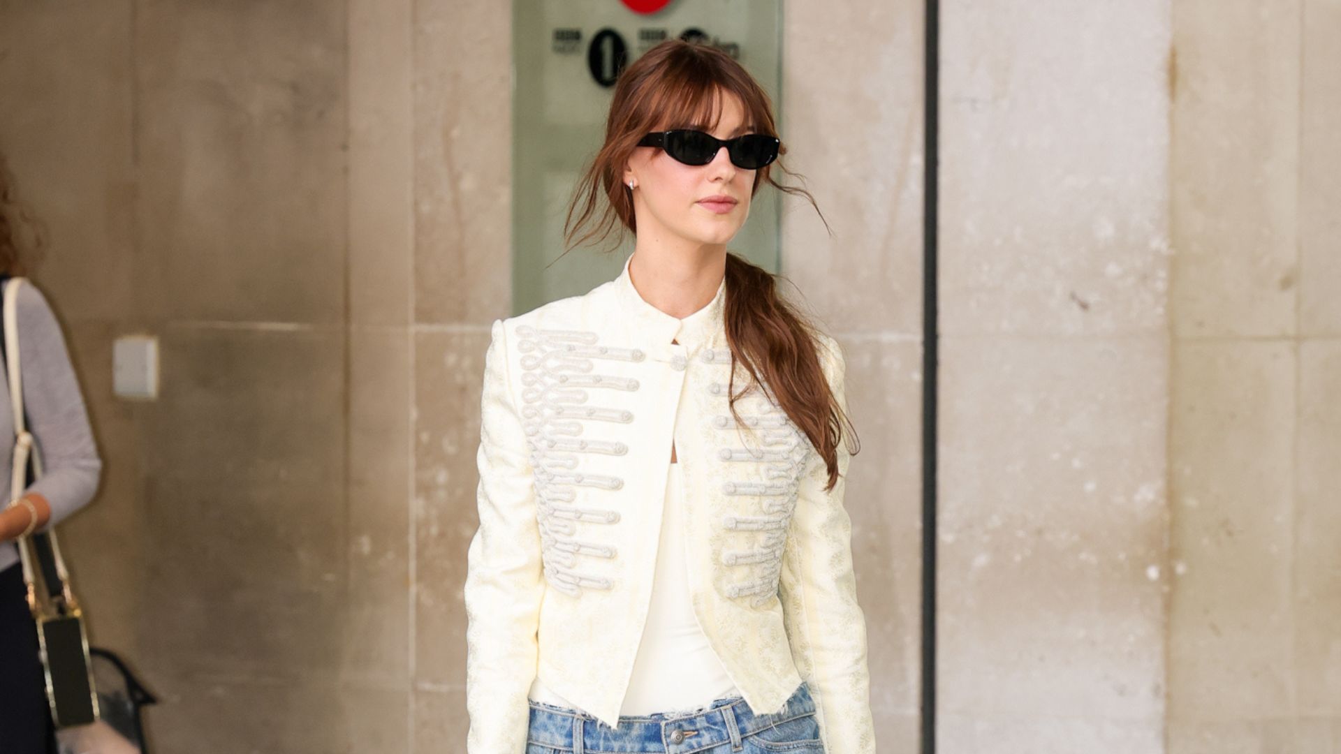 An image of Daisy Edgar-Jones wearing a Napoleon jacket out in London.