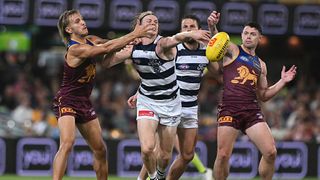 Zach Guthrie of the Cats competes for the ball in an AFL game between Brisbane Lions and Geelong Cats