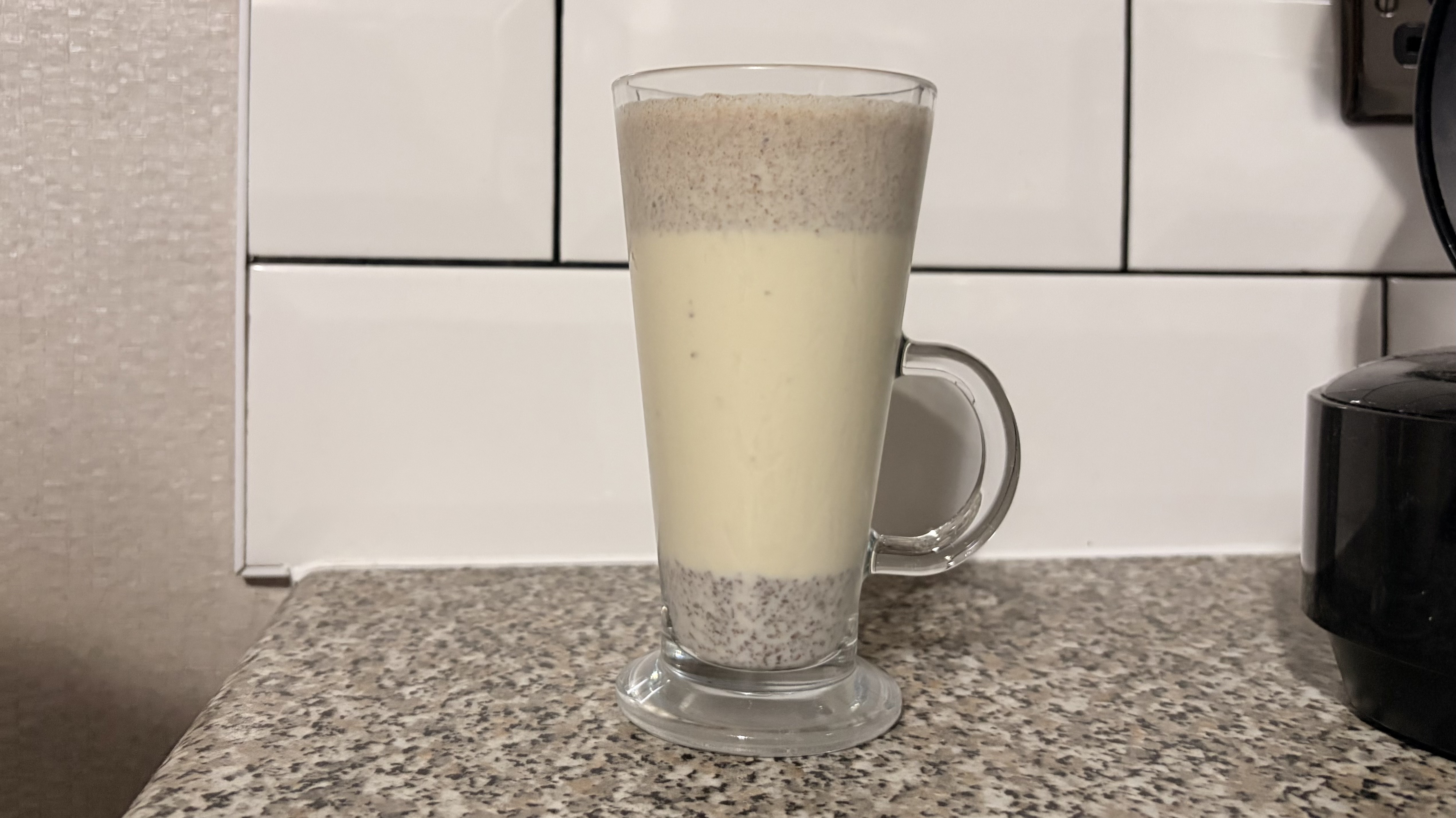 Milkshake made in the Nutribullet Flex blender photographed on a white background