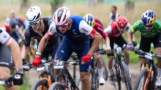 Victor Koretzky battles it out with Sam Gaze at the XCC short track worlds