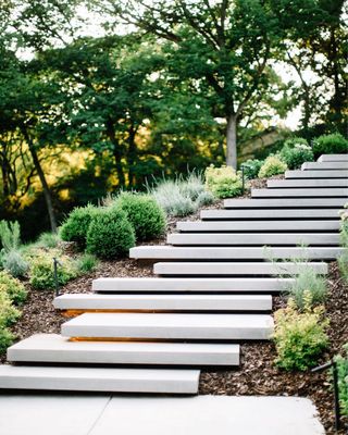 White stairs in a minimal backyard