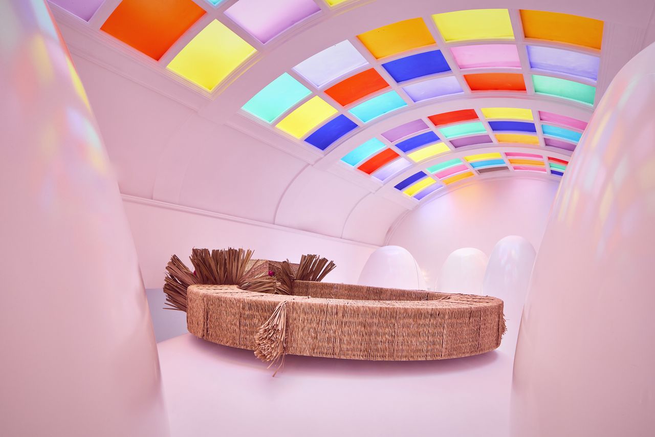 Installation view of &iexcl;hola, London!, a whimsical art installation made of whicker-made furniture molded after dragons, cacti, and fantastical creatures, at sketch London.