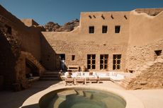 views of mud brick house with warm hues in desert building style, Bin Nouh's Courtyard House by Shahira Fahmy