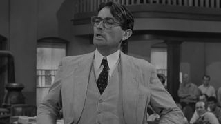 Atticus Finch defends his client in court in To Kill a Mockingbird