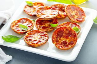 Mini salami pizzas