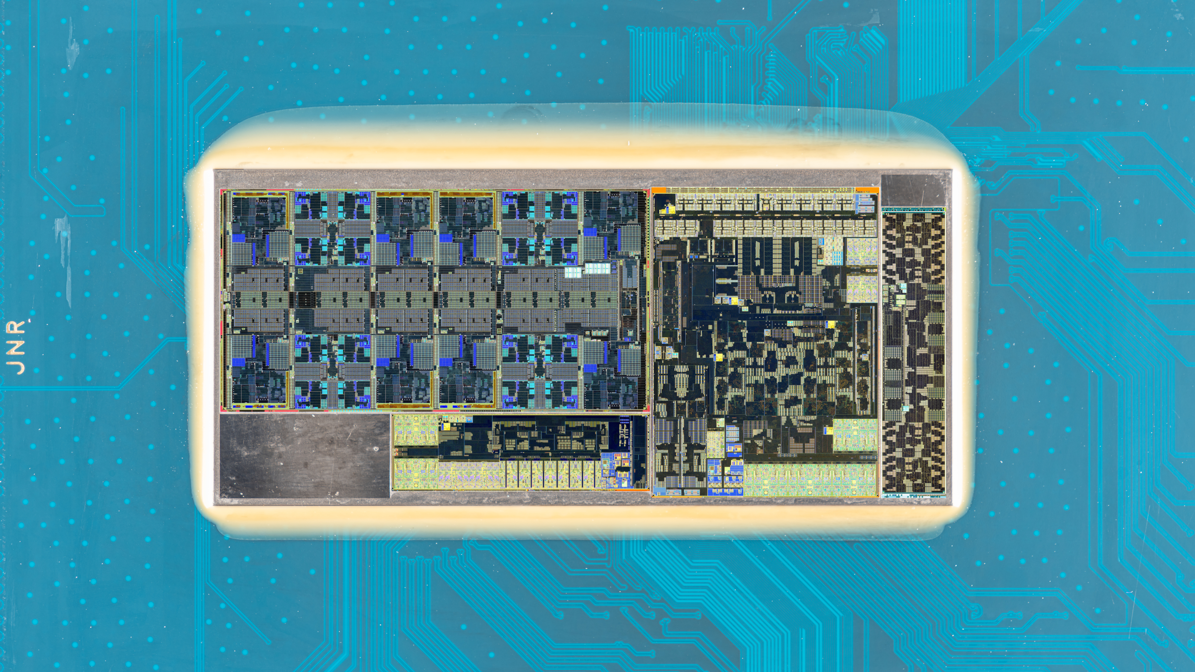 A close-up, detailed photo of a delidded Intel Core Ultra 200S processor, codenamed Arrow Lake, showing the structures of each tile comprising the processor.