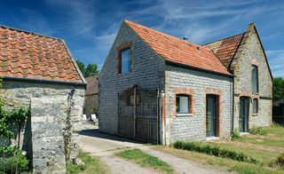 This stone barn conversion was carefully restored by its owners to retain its rural charm