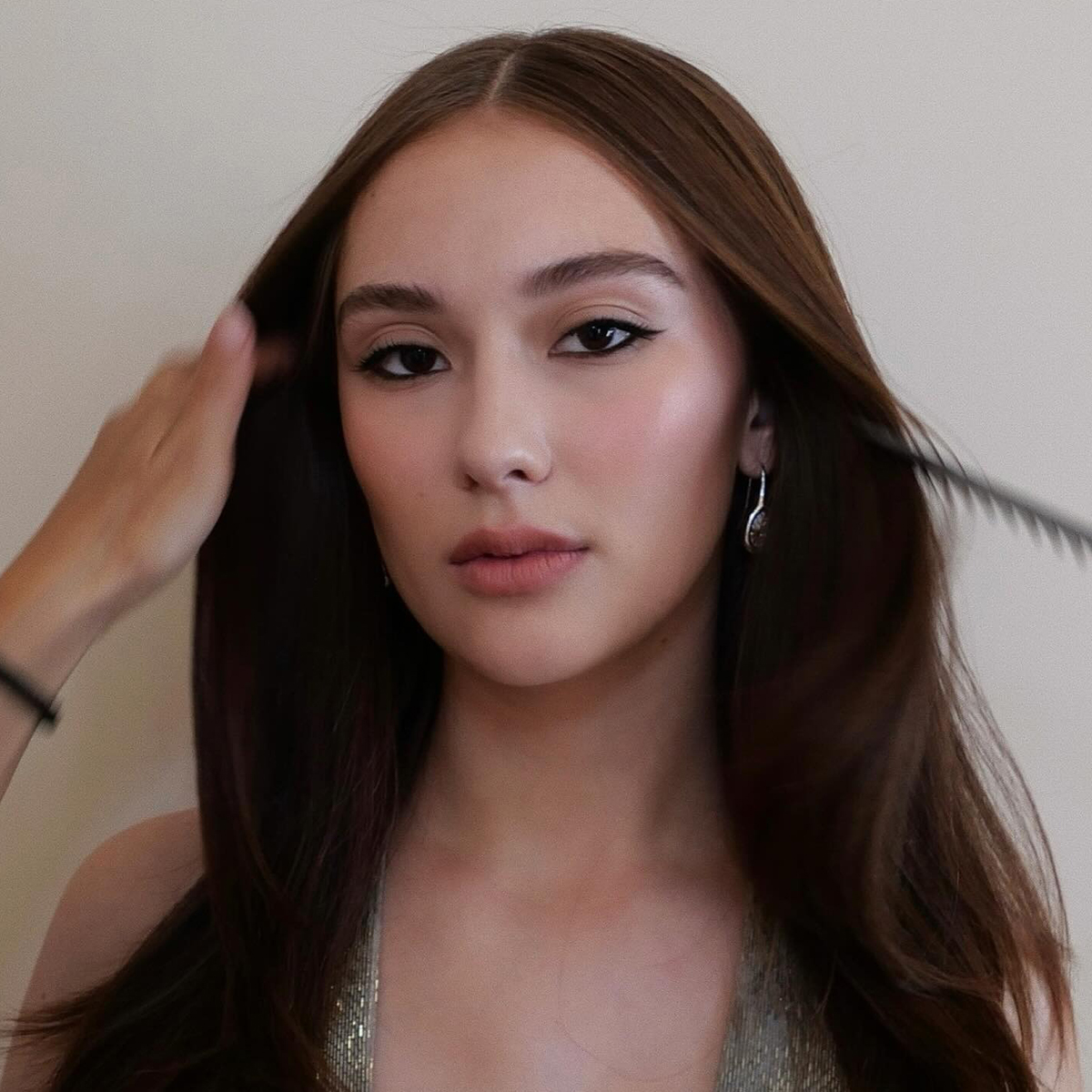 Lola Tung with brunette hair