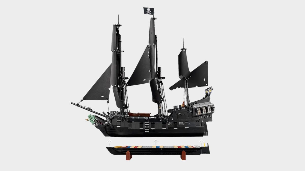 Lego Captain Jack Sparrow's Pirate Ship set with the bottom detached, all against a plain background