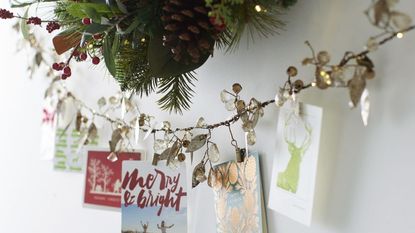 Best holiday card displays - Light Up Rustic Leaf Cardholder from Pottery Barn.