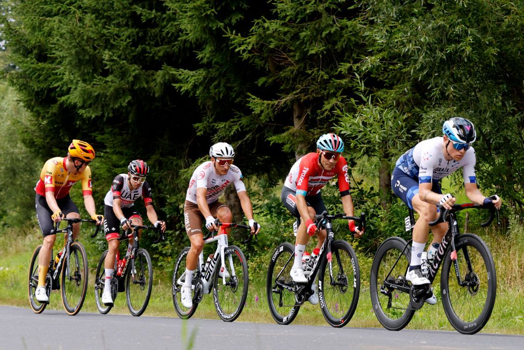 SANOK POLAND AUGUST 02 LR Anders Skaarseth of Norway and UNO X Pro Cycling Team Rui Oliveira of Portugal and UAE Team Emirates Nans Peters of France and AG2R Citren Team Kamil Malecki of Poland and Team Lotto Soudal and Mads Wrtz Schmidt of Denmark and Team Israel Premier Tech compete in the breakaway during the 79th Tour de Pologne 2022 Stage 4 a 1794km stage from Lesko to Sanok TdP22 WorldTour on August 02 2022 in Sanok Poland Photo by Bas CzerwinskiGetty Images