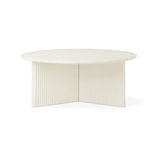 white coffee table with grooved base