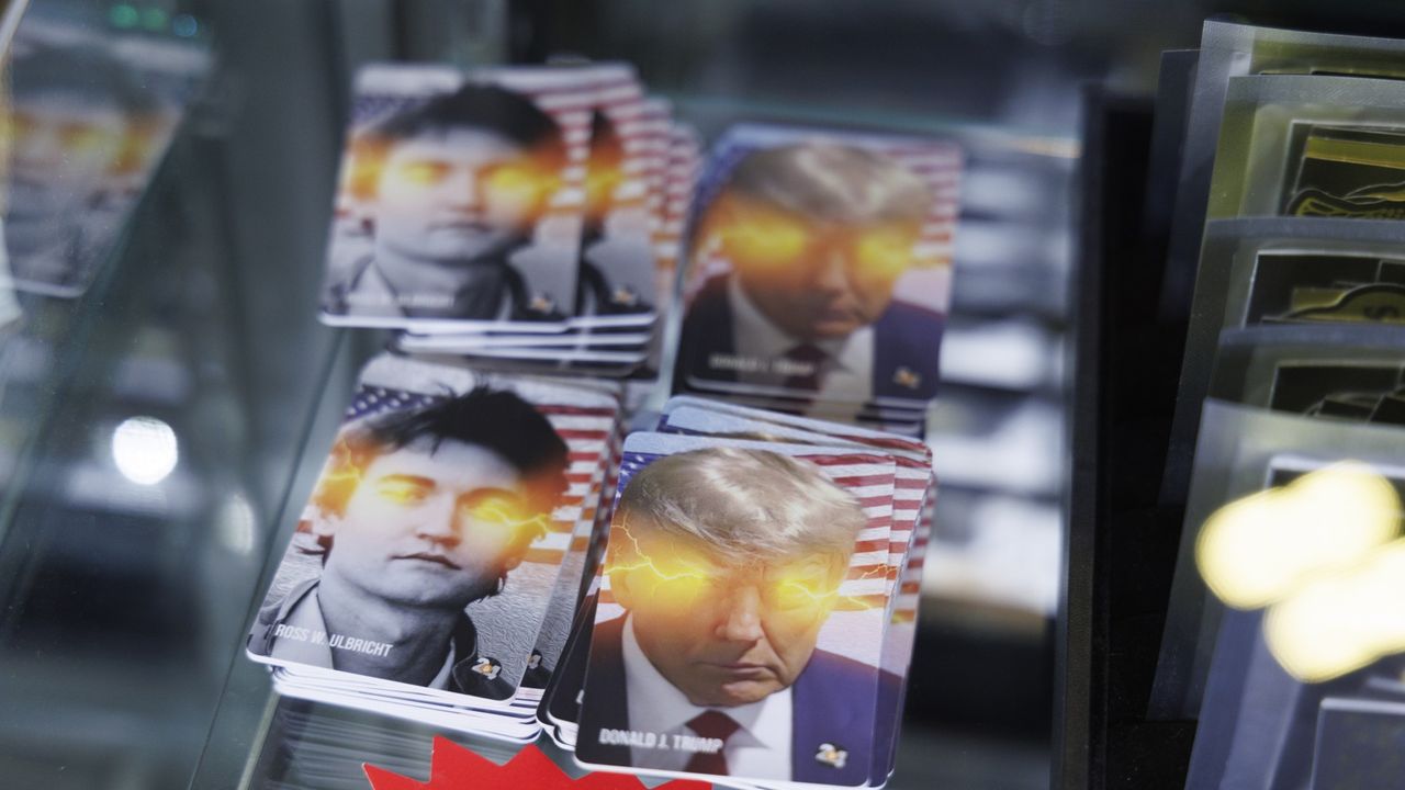 Mock trading cards of Donald Trump and Ross Ulbricht for sale at the 2024 Bitcoin Conference.