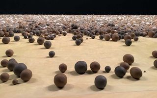 clay balls on a giant table