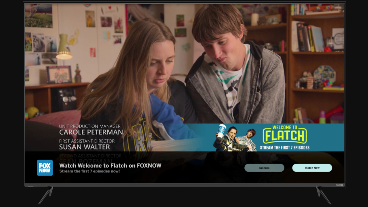 a fox tv show playing on a vizio tv, showing a banner ad at the bottom of the screen