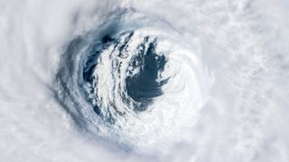 Climate change is pushing hurricanes to their extremes. In 2018, Hurricane Michael (shown here in this digitally enhanced image) became the first Category 5 hurricane to make landfall on the Florida Panhandle.