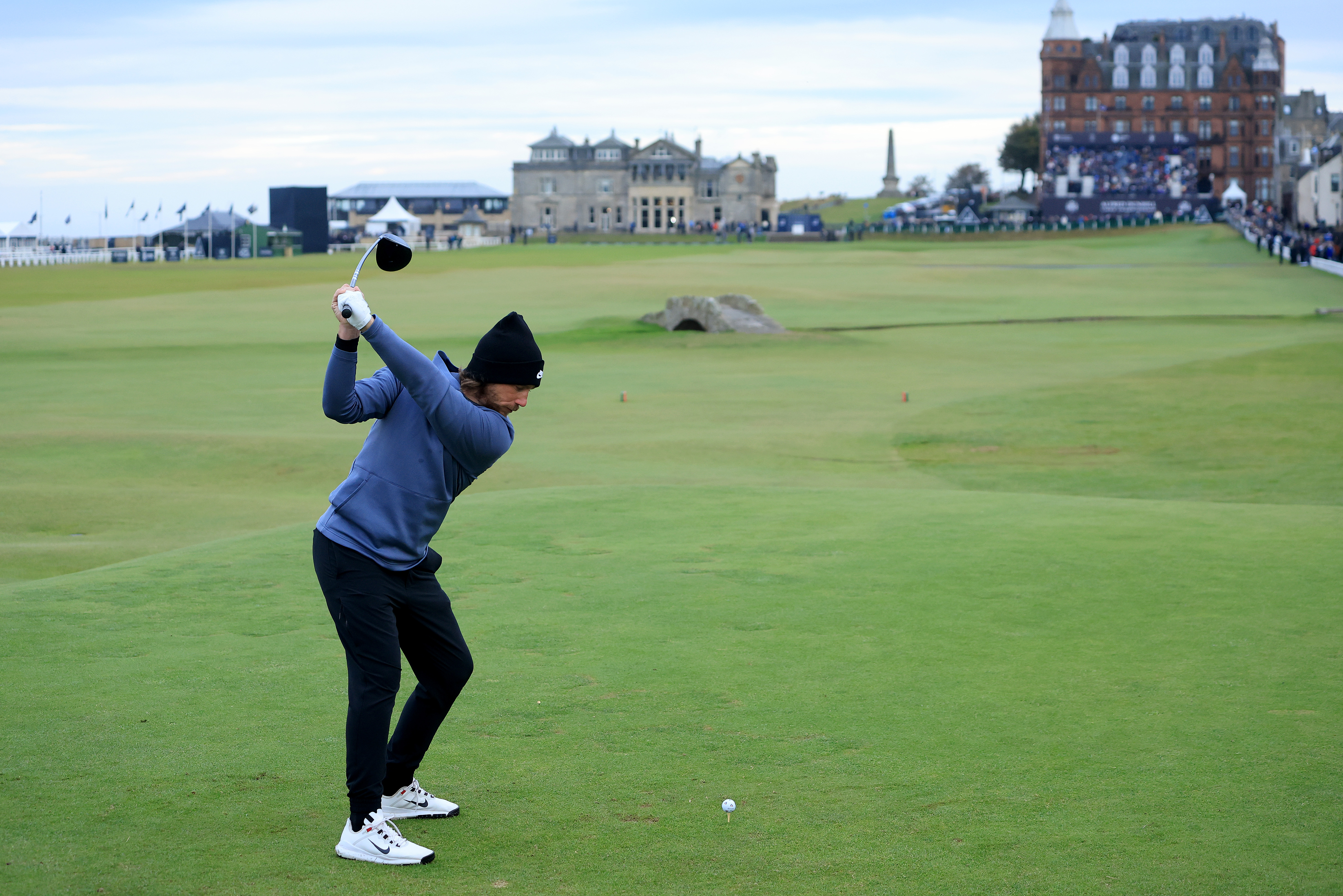 Tommy Fleetwood hits a tee shot at the 18th of St Andrews