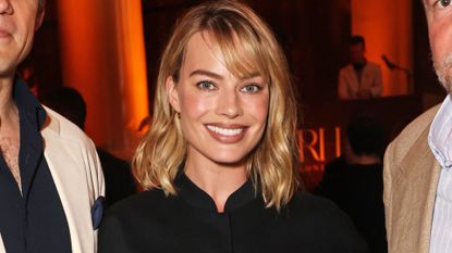A HEADSHOT OF MARGOT ROBBIE