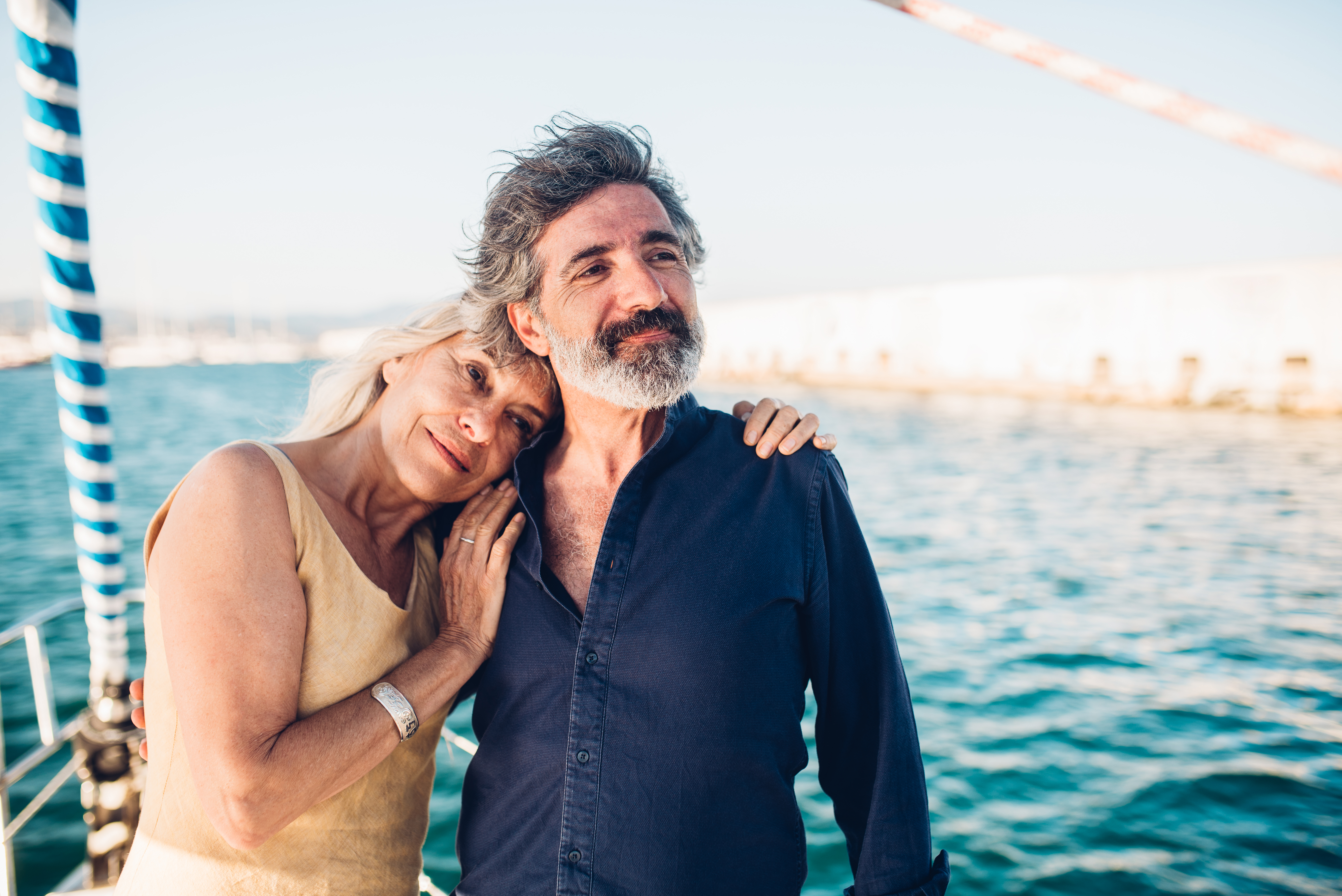 Portrait of a senior couple enjoying cruising on their yacht.