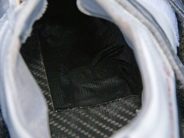 The sole plate is so thin that the two-bolt cleat inserts can not be recessed and protrude into the insole. And yes, unfortunately that is hardware store tape covering is all up.