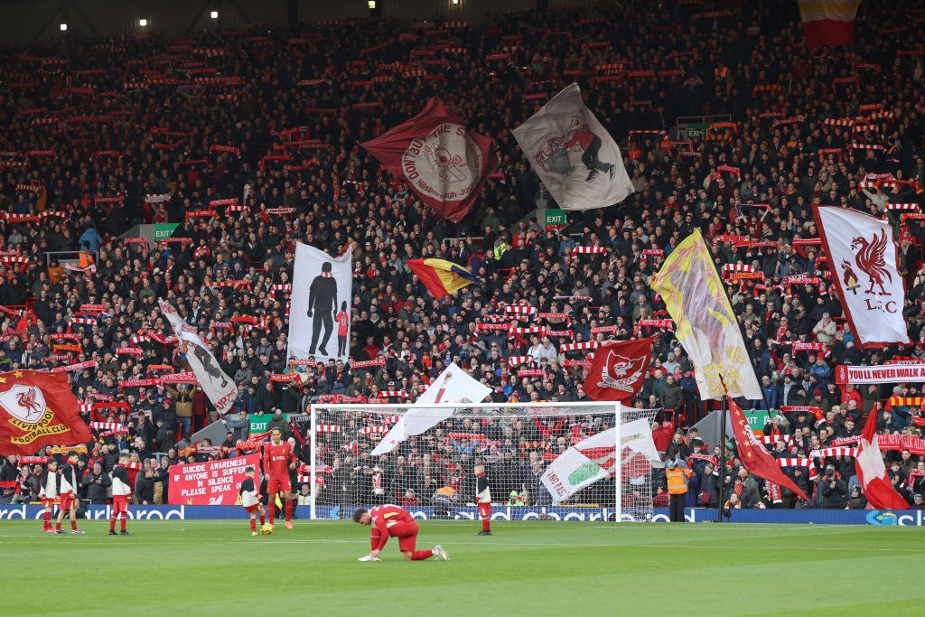 Liverpool flags wave on the Kop as the fans sing &#039;you&#039;ll never walk alone&#039; prior to the Premier League match between Liverpool FC and Ipswich Town FC at Anfield on January 25, 2025 in Liverpool, England.