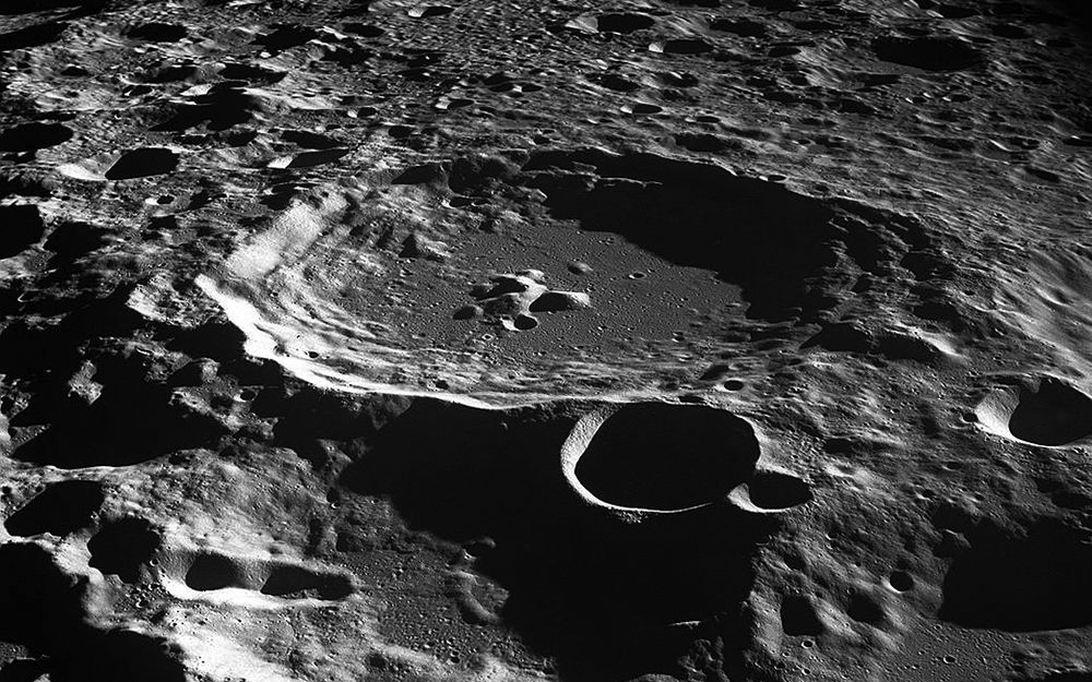 An oblique view of the Daedalus Crater on the far side of the moon, as seen from the Apollo 11 spacecraft in lunar orbit.