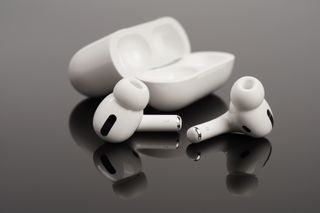 AirPod Pro headphones and case