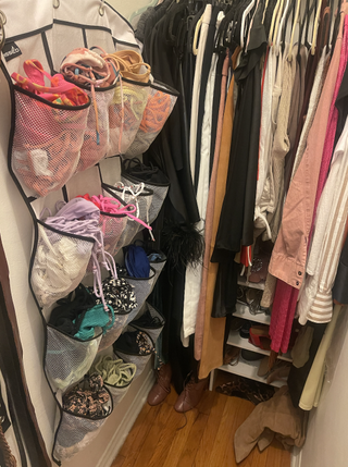 photo of swimsuits organized in closet