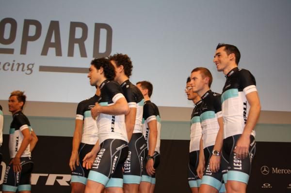 The riders flood the stage