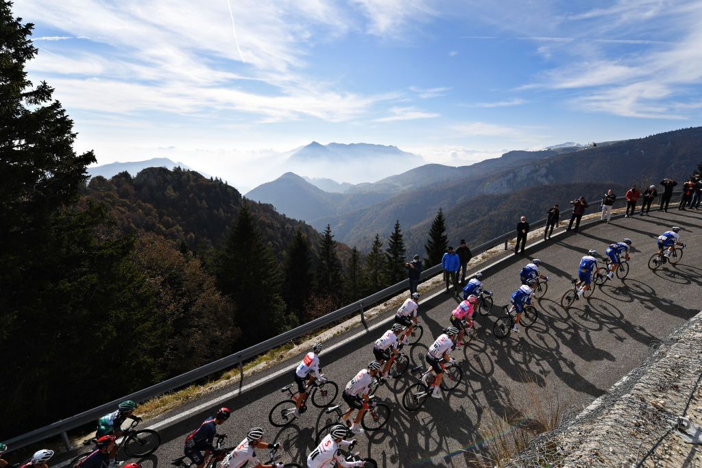 MADONNA DI CAMPIGLIO ITALY OCTOBER 21 Jai Hindley of Australia and Team Sunweb White Best Young Rider Jersey Wilco Kelderman of The Netherlands and Team Sunweb Sam Oomen of The Netherlands and Team Sunweb Nico Denz of Germany and Team Sunweb Joao Almeida of Portugal and Team Deceuninck QuickStep Pink Leader Jersey Davide Ballerini of Italy and Team Deceuninck QuickStep Alvaro Jose Hodeg Chagui of Colombia and Team Deceuninck QuickStep Mikkel Honore of Denmark and Team Deceuninck QuickStep Iljo Keisse of Belgium and Team Deceuninck QuickStep James Knox of The United Kingdom and Team Deceuninck QuickStep Forcella Valbona 1782m Landscape Peloton Mountains during the 103rd Giro dItalia 2020 Stage 17 a 203km stage from Bassano del Grappa to Madonna di Campiglio 1514m girodiitalia Giro on October 21 2020 in Madonna di Campiglio Italy Photo by Tim de WaeleGetty Images
