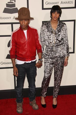 Pharrell Williams And Helen Lasichanh At The Grammys 2014