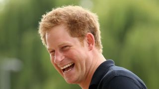 london, england september 14 prince harry conducts an interview for the invictus games outside the aquatics centre during the invictus games at queen elizabeth park on september 14, 2014 in london, england the international sports event for wounded warriors, presented by jaguar land rover was an idea developed by prince harry after he visited the warrior games in colorado usa the four day event has brought together thirteen teams from around the world to compete in nine events such as wheelchair basketball and sitting volleyball photo by chris jacksongetty images