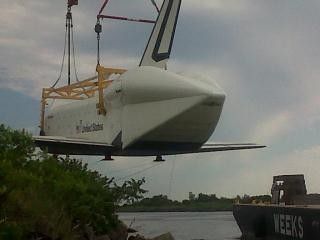Shuttle Enterprise Lifted onto Barge
