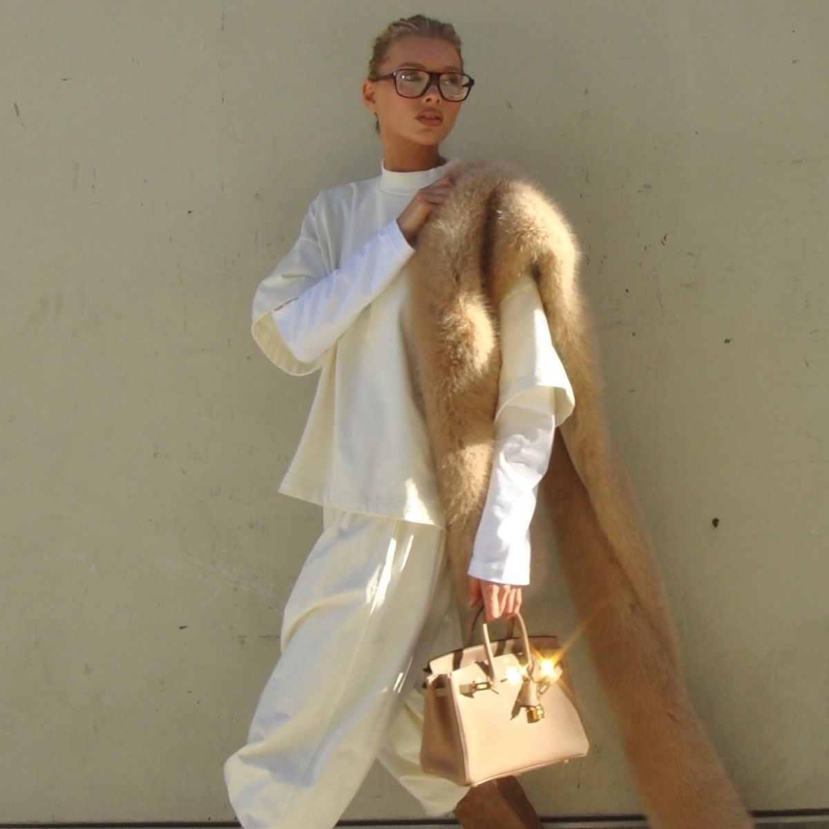 An image of Elsa Hosk wearing one of the best long-sleeved tops.