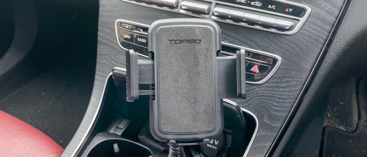 TOPGO Cup Holder Phone Mount shown on a car dash