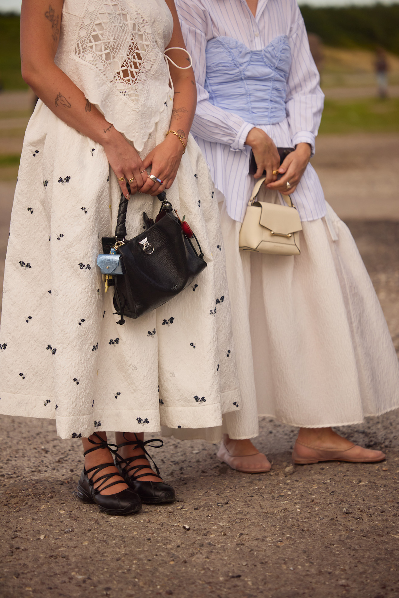 image of women carrying handbags