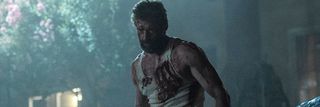 Logan Wolverine Hugh Jackman bloodied and scarred
