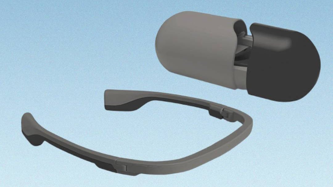 The carbon and graphite black AYO+ Blue Light Therapy Glasses on a blue background