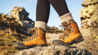 a photo of a woman wearing walking boots