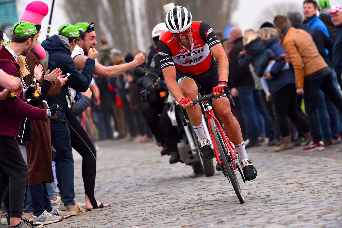John Degenkolb grimaces as he tackles the cobbles