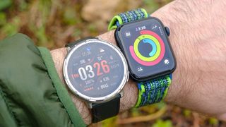 Close-up of the Amazfit Active 2 and Apple Watch SE next to each other on a user's wrist