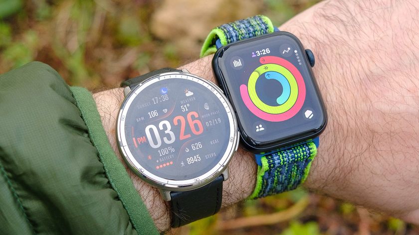 Close-up of the Amazfit Active 2 and Apple Watch SE next to each other on a user&#039;s wrist